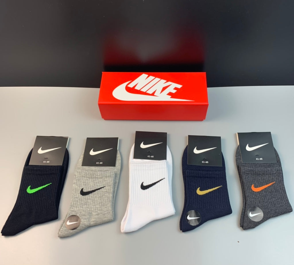 Nike neutral colored swoosh socks, image 1