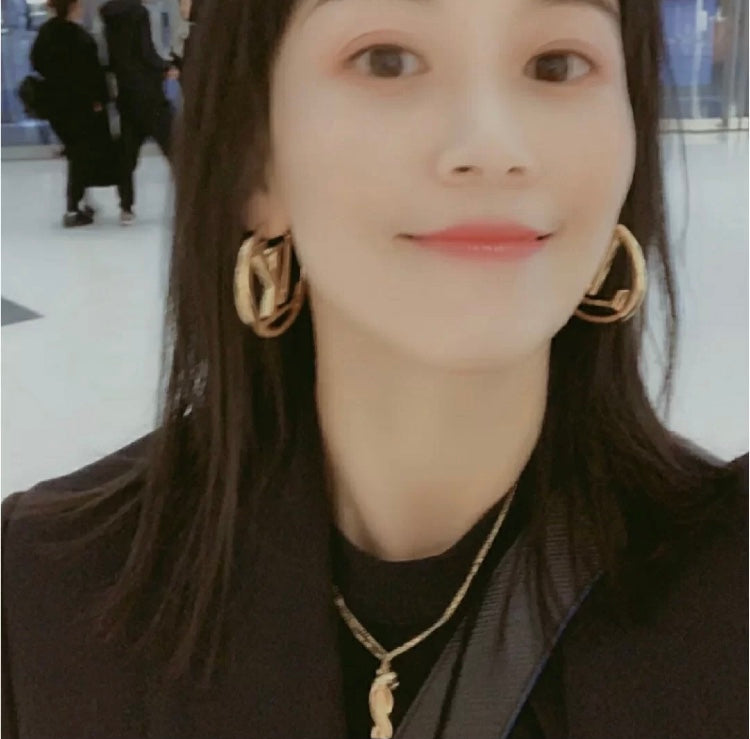 Louis Vuitton Circular Polished Earrings - album image 8