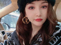 Louis Vuitton Circular Polished Earrings - album image 1