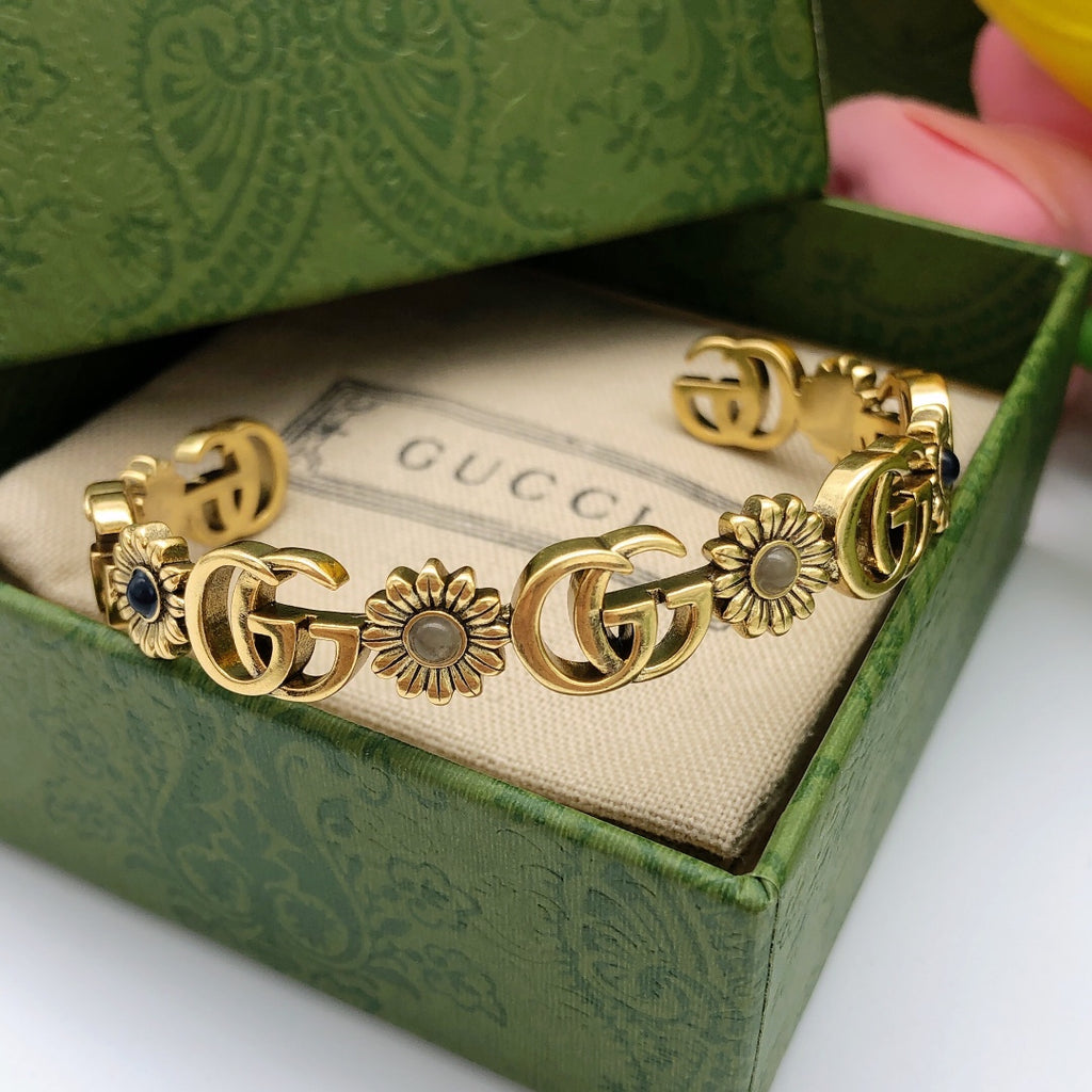 Gucci Interlocking G Antique Gold-Tone Sunflower Bangle - album image 2
