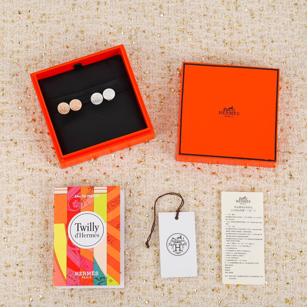 Hermès Gold and Silver-Tone Round Disc Stud Earrings - album image 1
