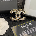 Chanel Gold-Tone Crystal Interlocking C Brooch - album image 1
