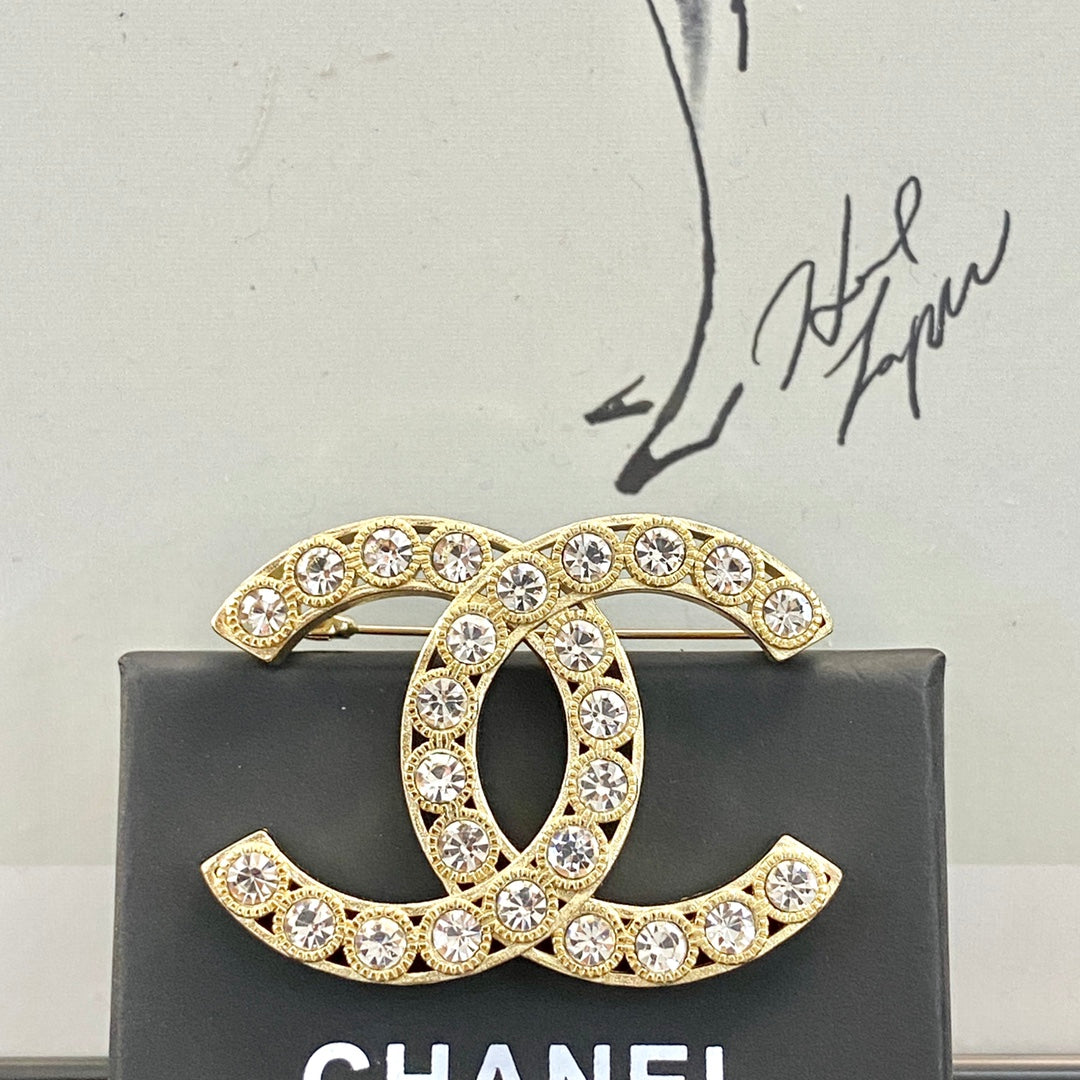 Chanel Interlocking C Crystal Accent Brooch - album image 1
