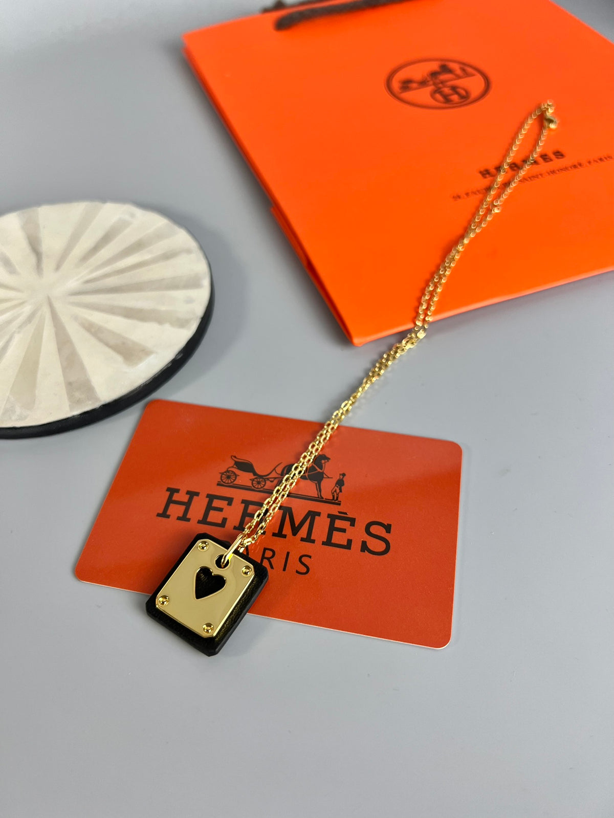 Hermès Silver-Tone Round H Tag Pendant Necklace - album image 6