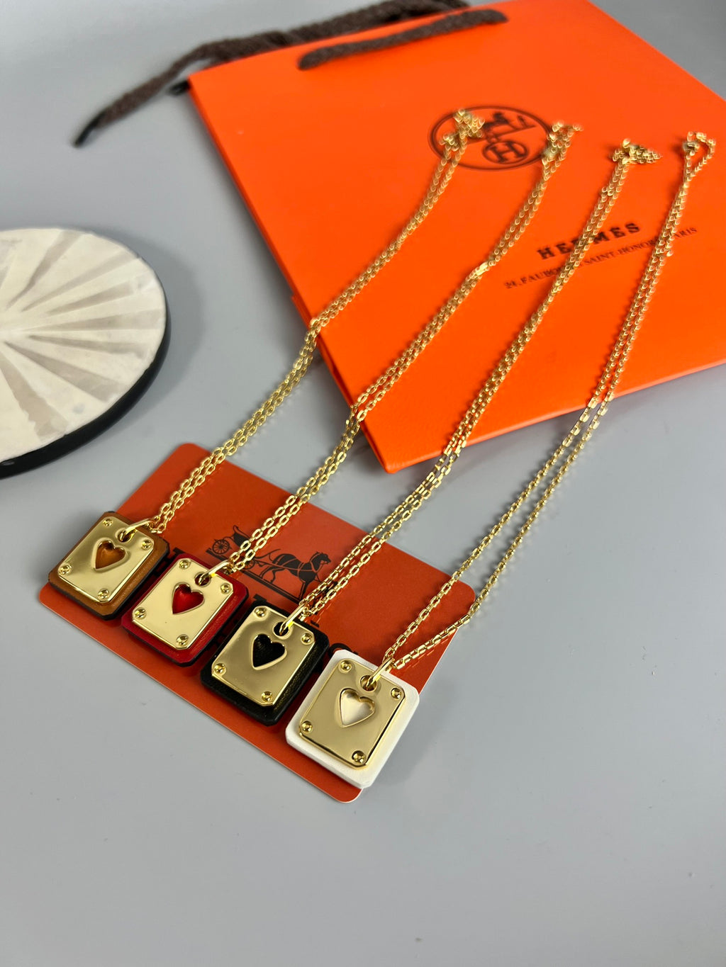 Hermès Silver-Tone Round H Tag Pendant Necklace - album image 9