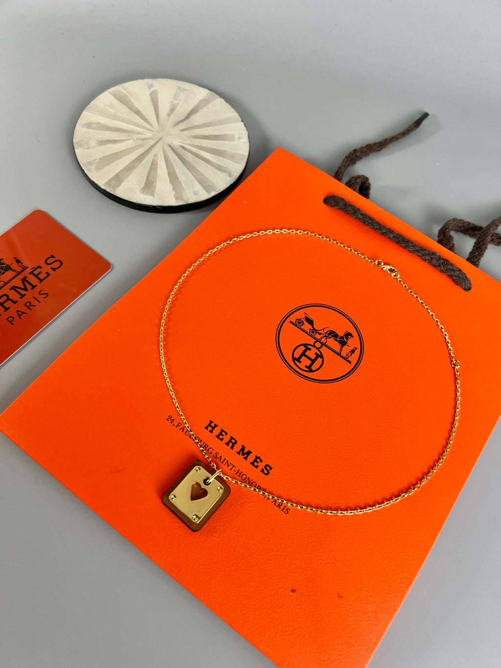 Hermès Silver-Tone Round H Tag Pendant Necklace - album image 5