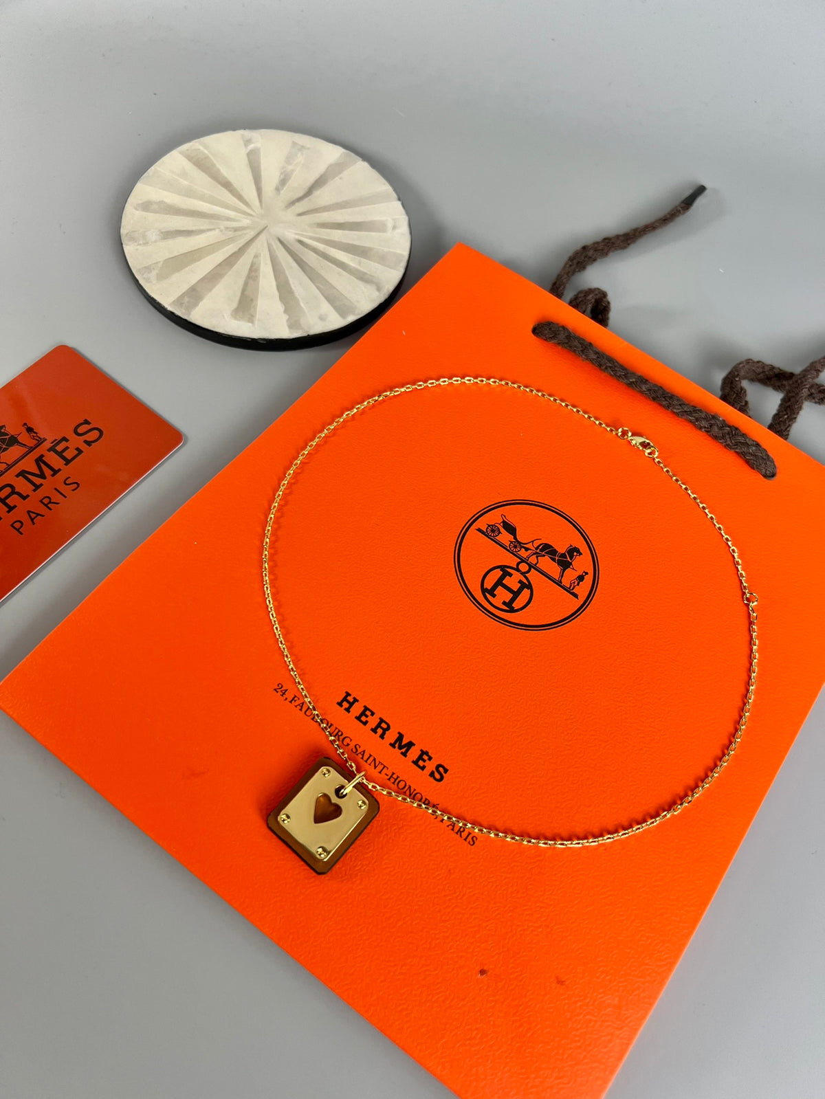 Hermès Silver-Tone Round H Tag Pendant Necklace - album image 5