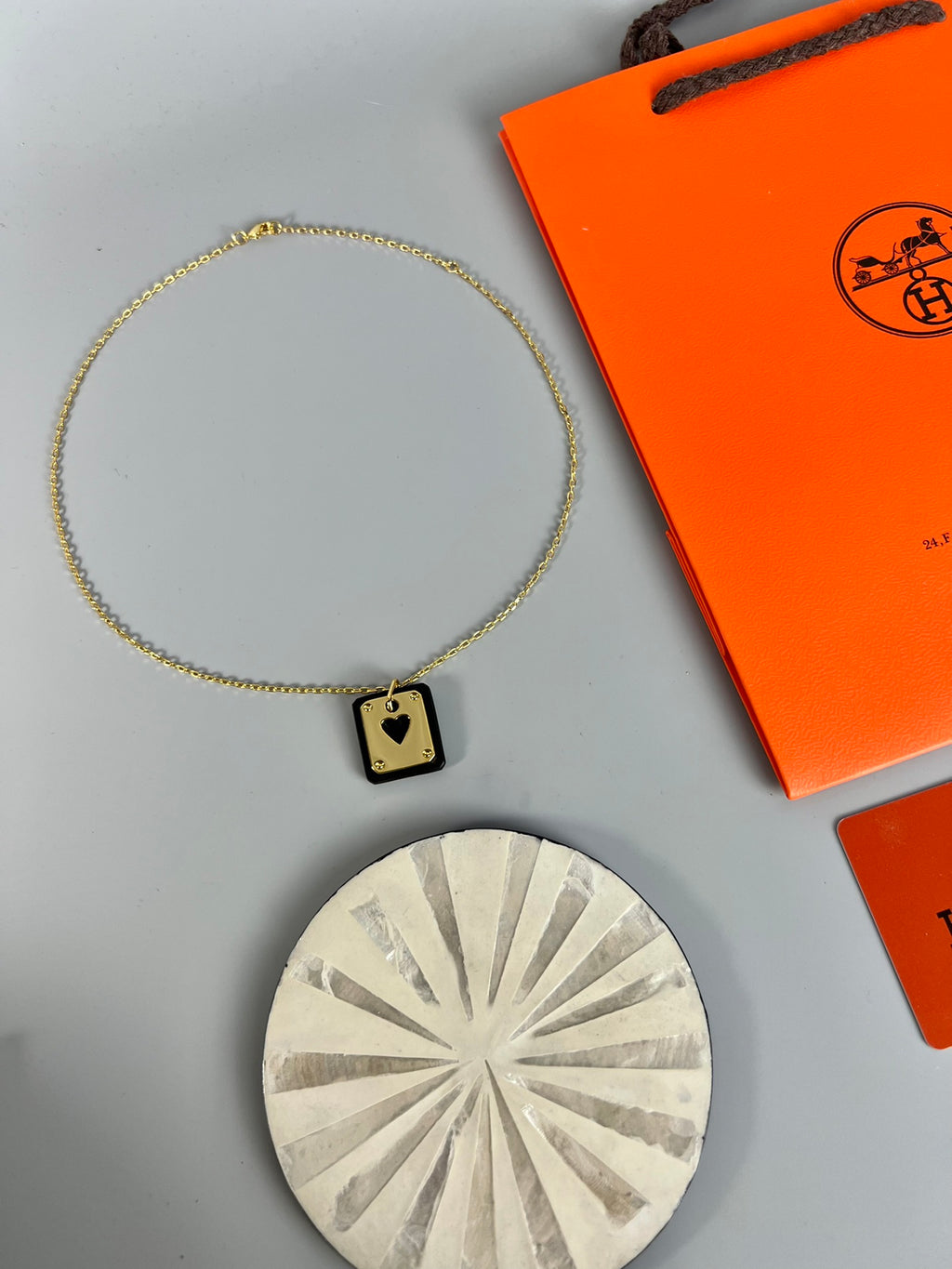 Hermès Silver-Tone Round H Tag Pendant Necklace - album image 2