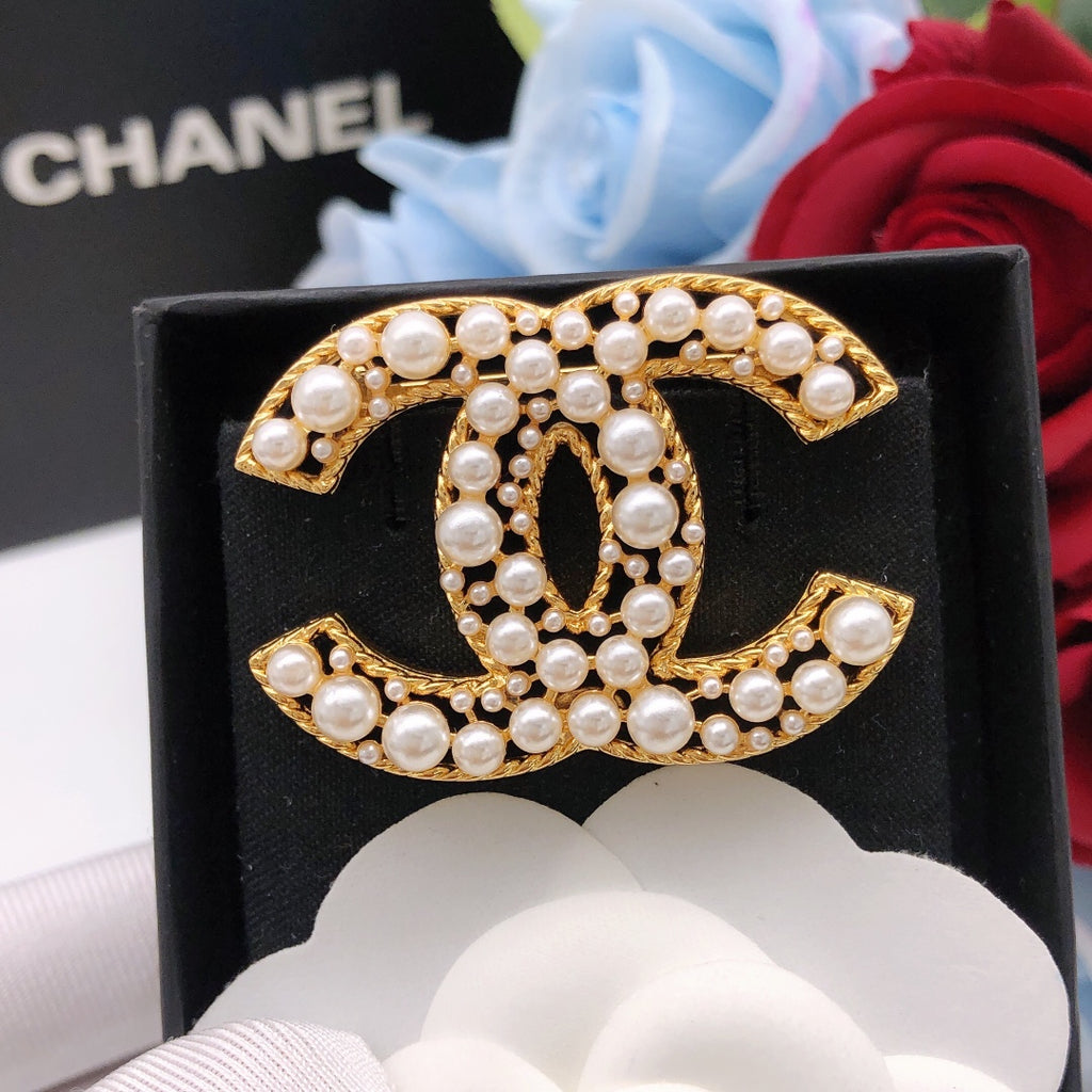 Chanel Interlocking C Pearl Brooch - album image 1