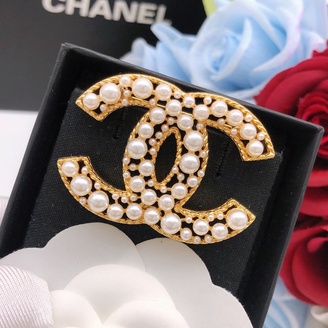 Chanel Interlocking C Pearl Brooch - album image 2