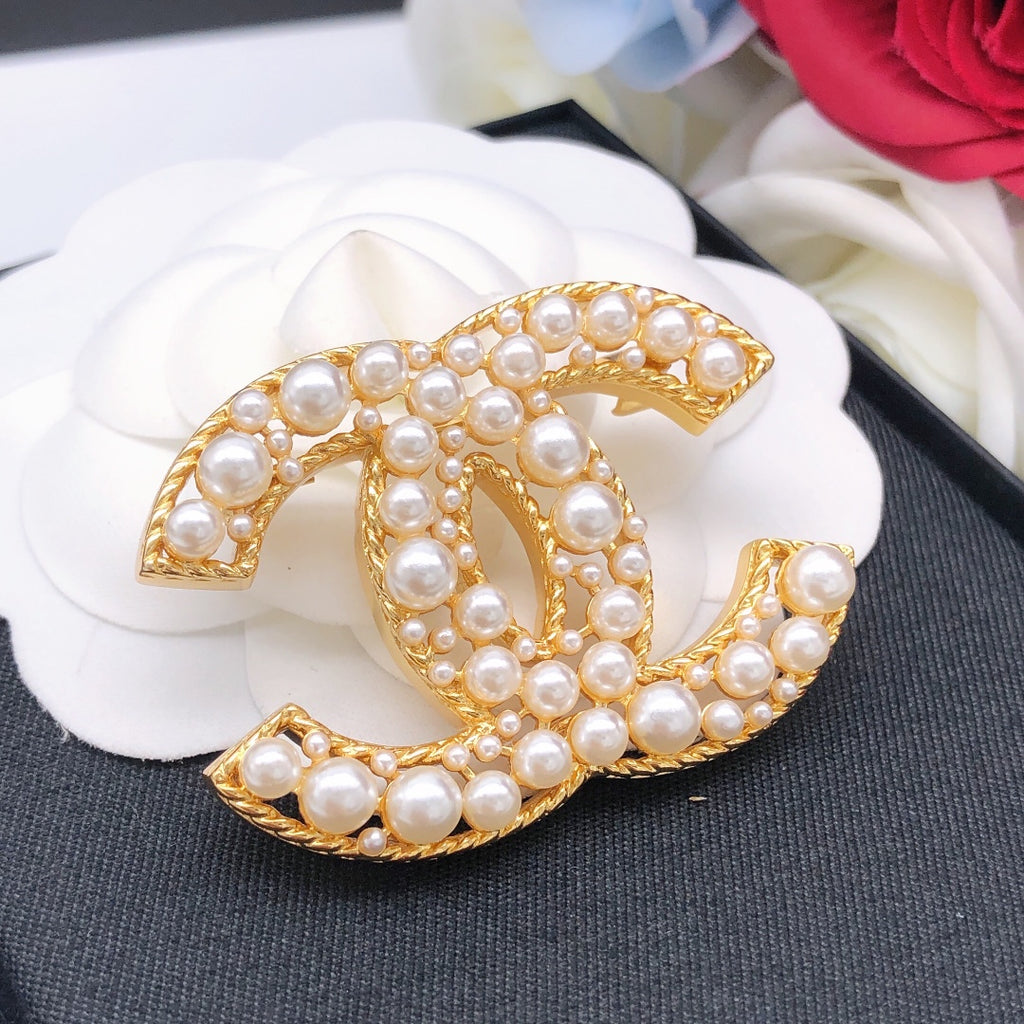 Chanel Interlocking C Pearl Brooch - album image 9