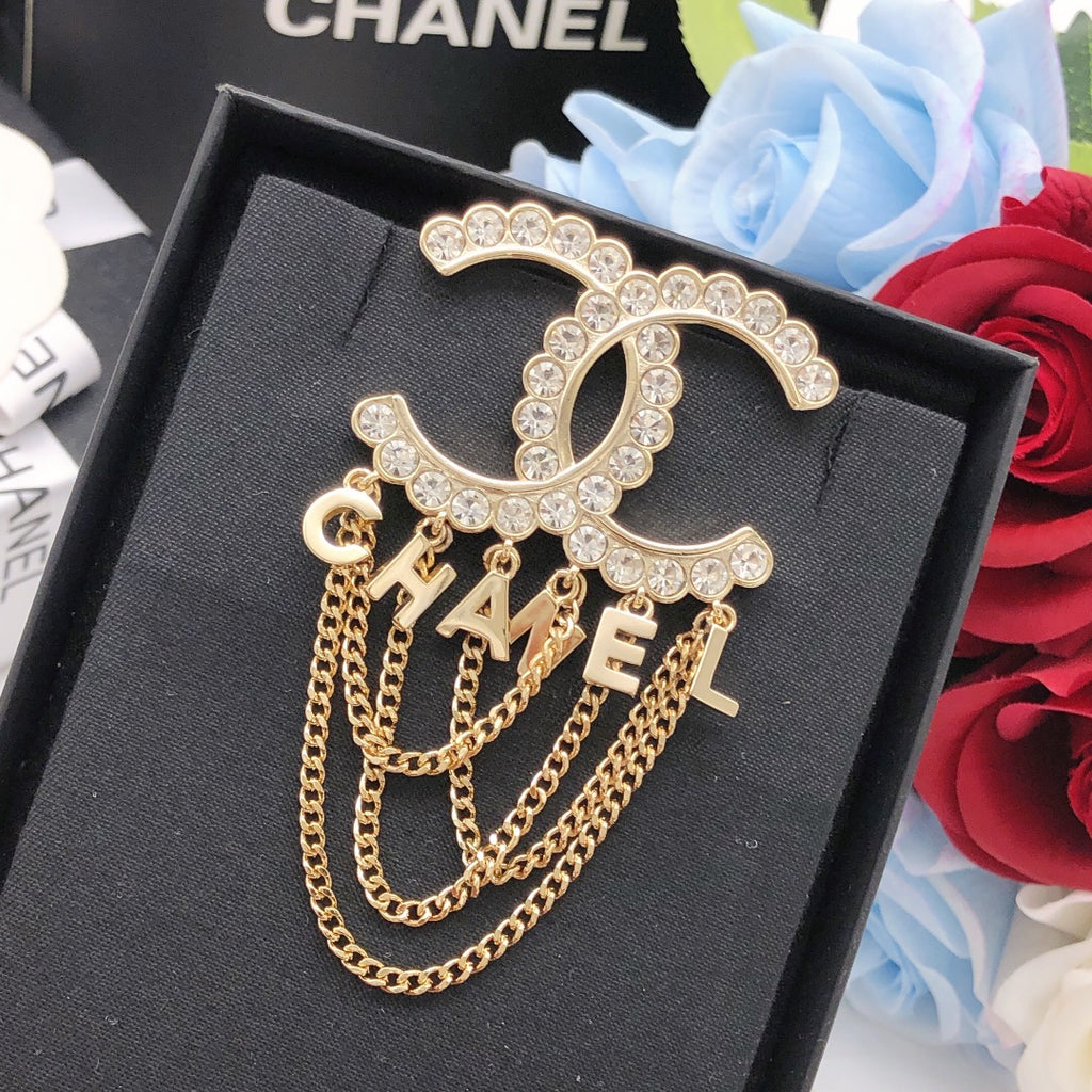 Chanel Letter Tassel Brooch - album image 1