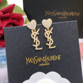 Saint Laurent Crystal Heart Monogram Drop Earrings in Two Metal Tones - album image 1