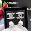 Chanel Pearl Earrings - album image 1
