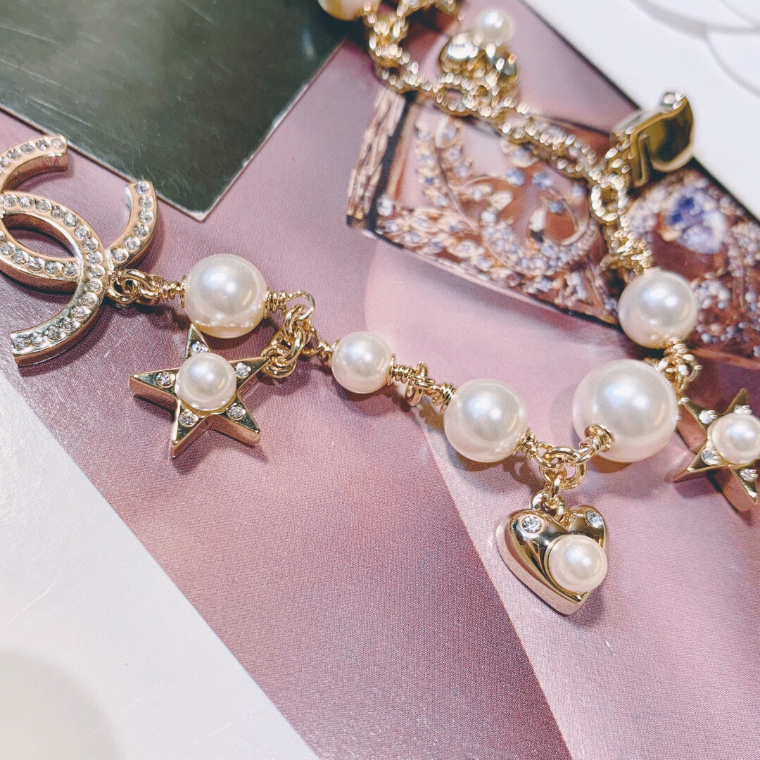 Chanel Interlocking C Pearl Heart Crystal Accent Necklace - album image 5