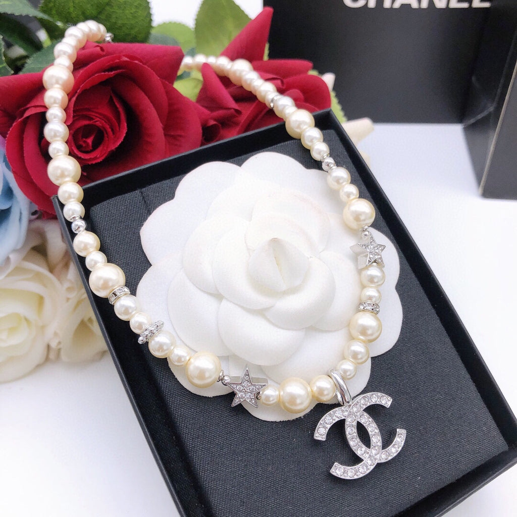 Chanel Silver-Tone Star Necklace - album image 3