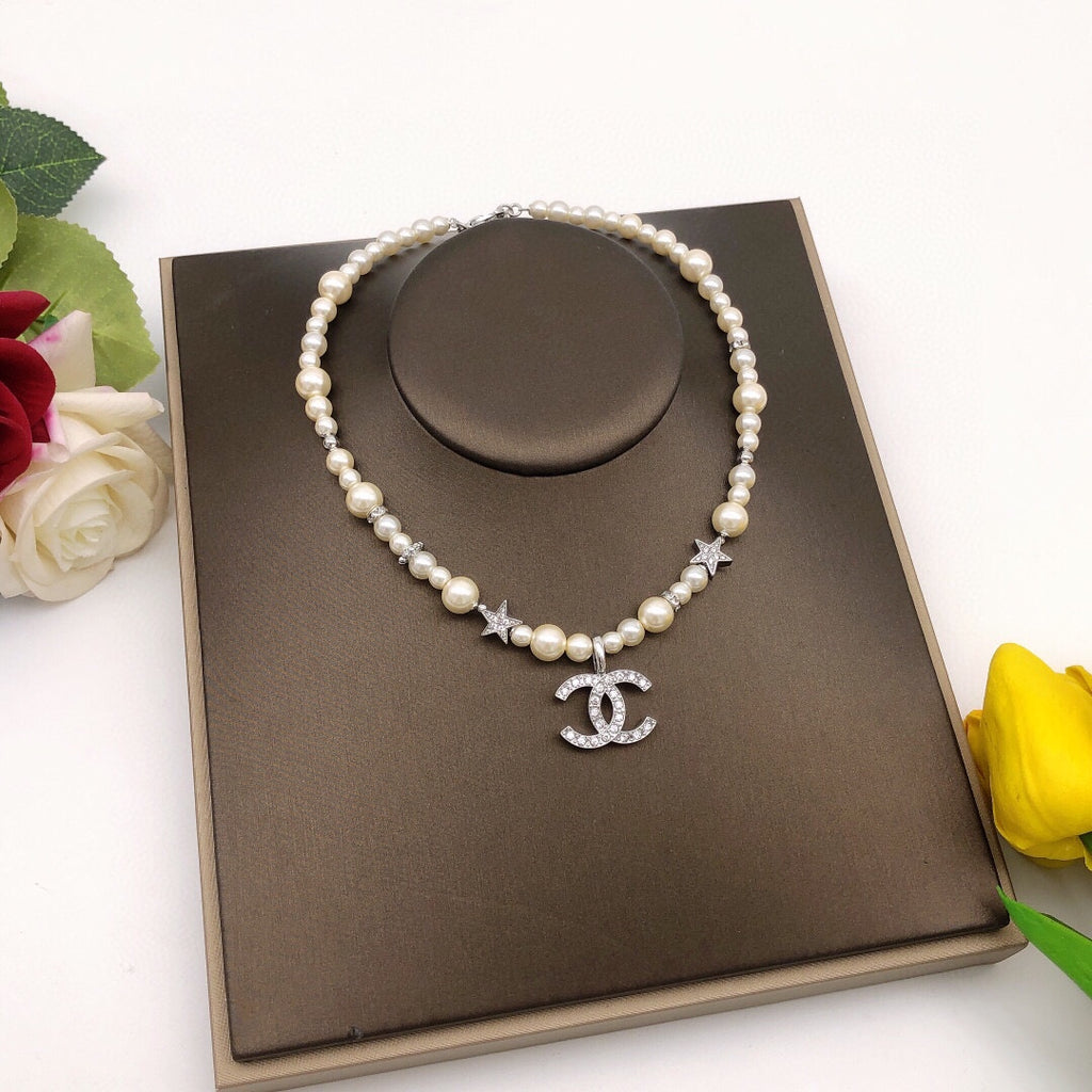 Chanel Silver-Tone Star Necklace - album image 7