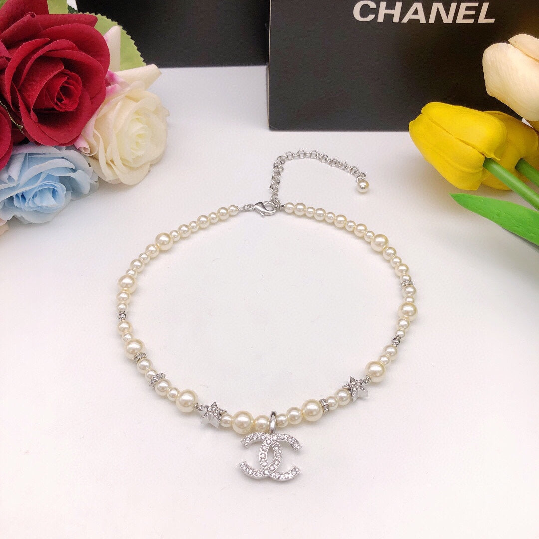 Chanel Silver-Tone Star Necklace - album image 4