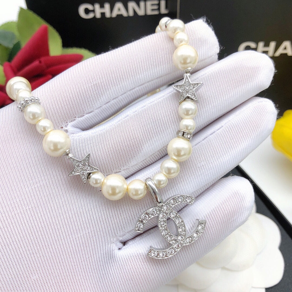 Chanel Silver-Tone Star Necklace - album image 2