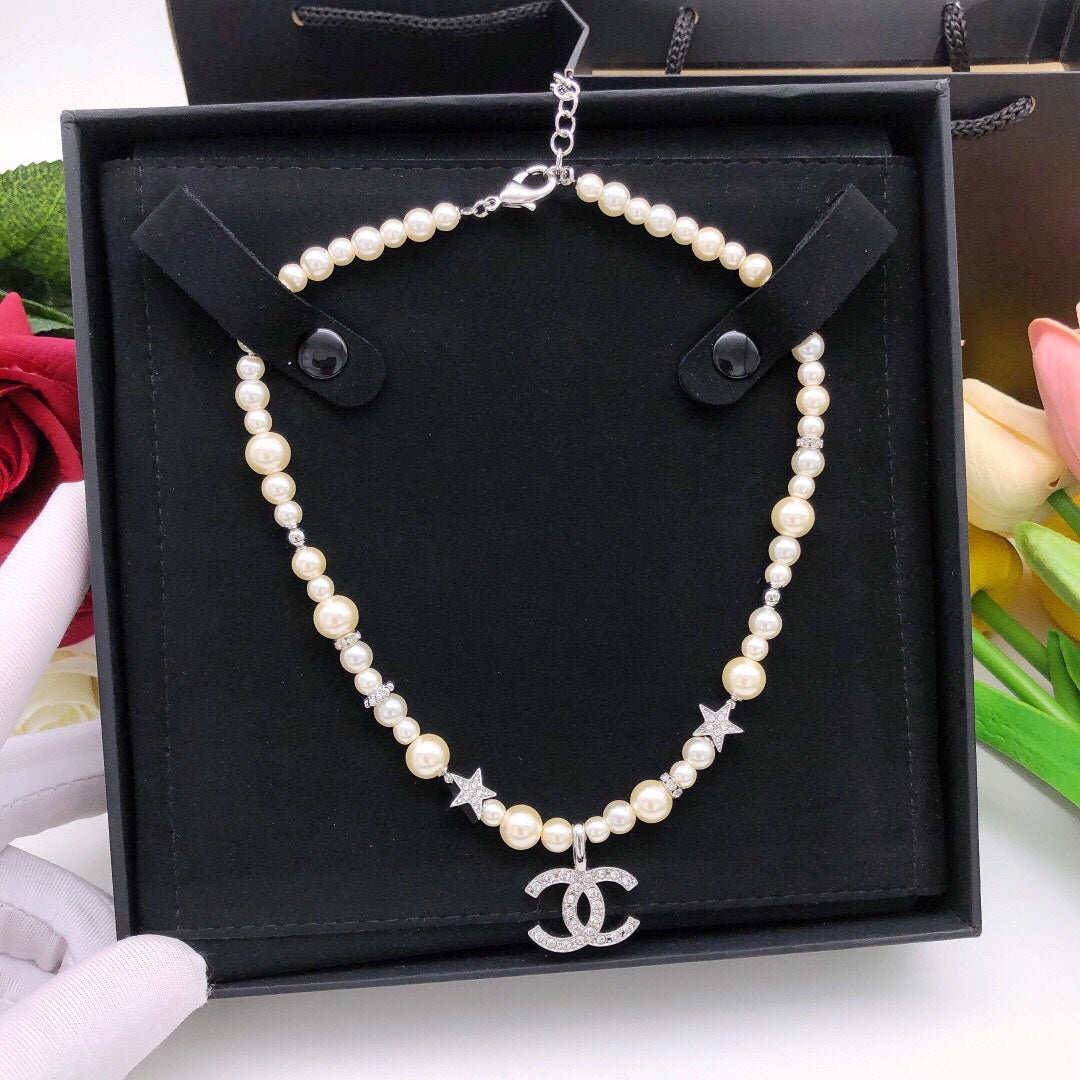 Chanel Silver-Tone Star Necklace - album image 1