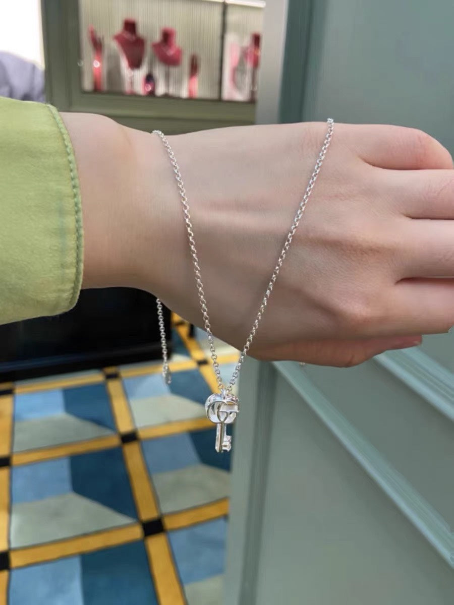 Gucci Interlocking G Key Pendant Bracelet - album image 2