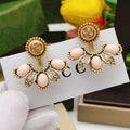 Gucci Interlocking G Pink Flower Earrings - album image 1