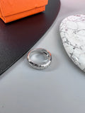 Hermès Silver-Tone Sculptural Band Ring - album image 1