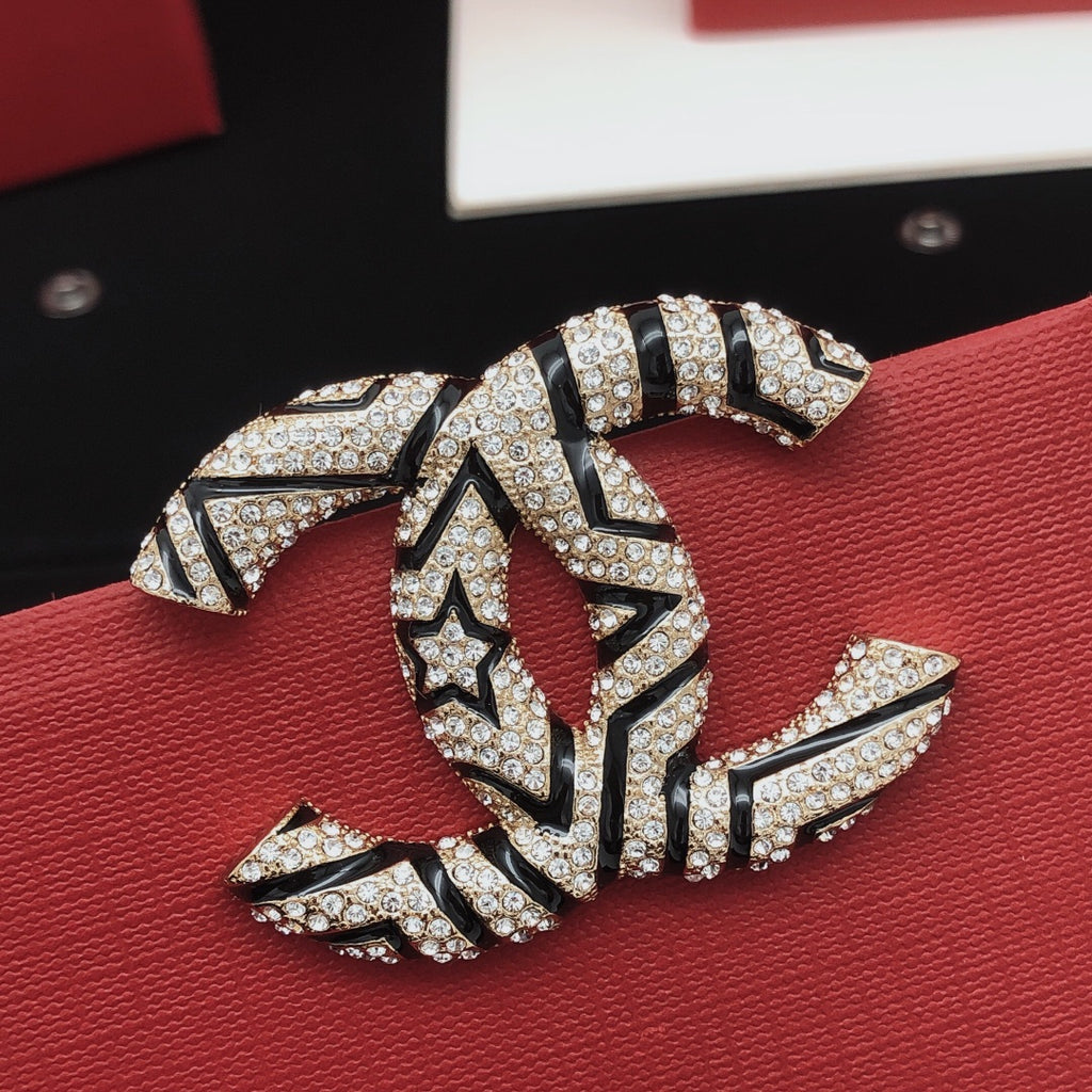 Chanel Enamel Black Star Brooch - album image 1
