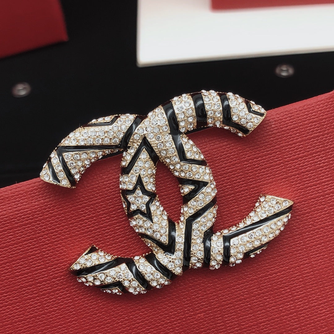 Chanel Enamel Black Star Brooch - album image 1