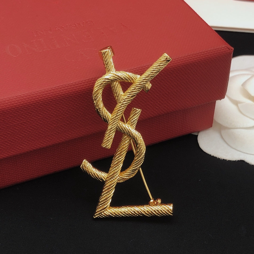 Saint Laurent Gold-Tone Textured Monogram Brooch - album image 9