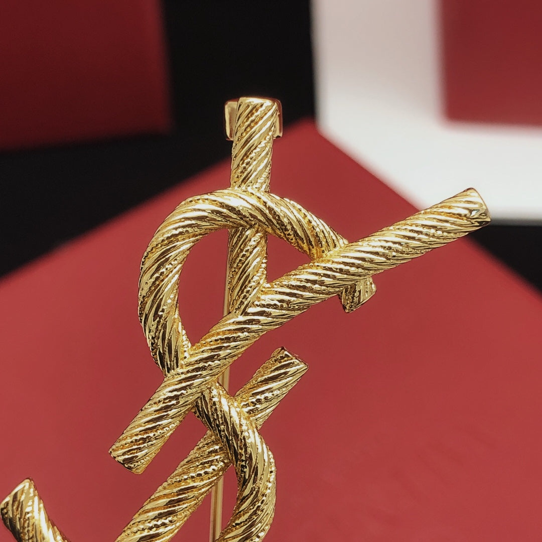 Saint Laurent Gold-Tone Textured Monogram Brooch - album image 4