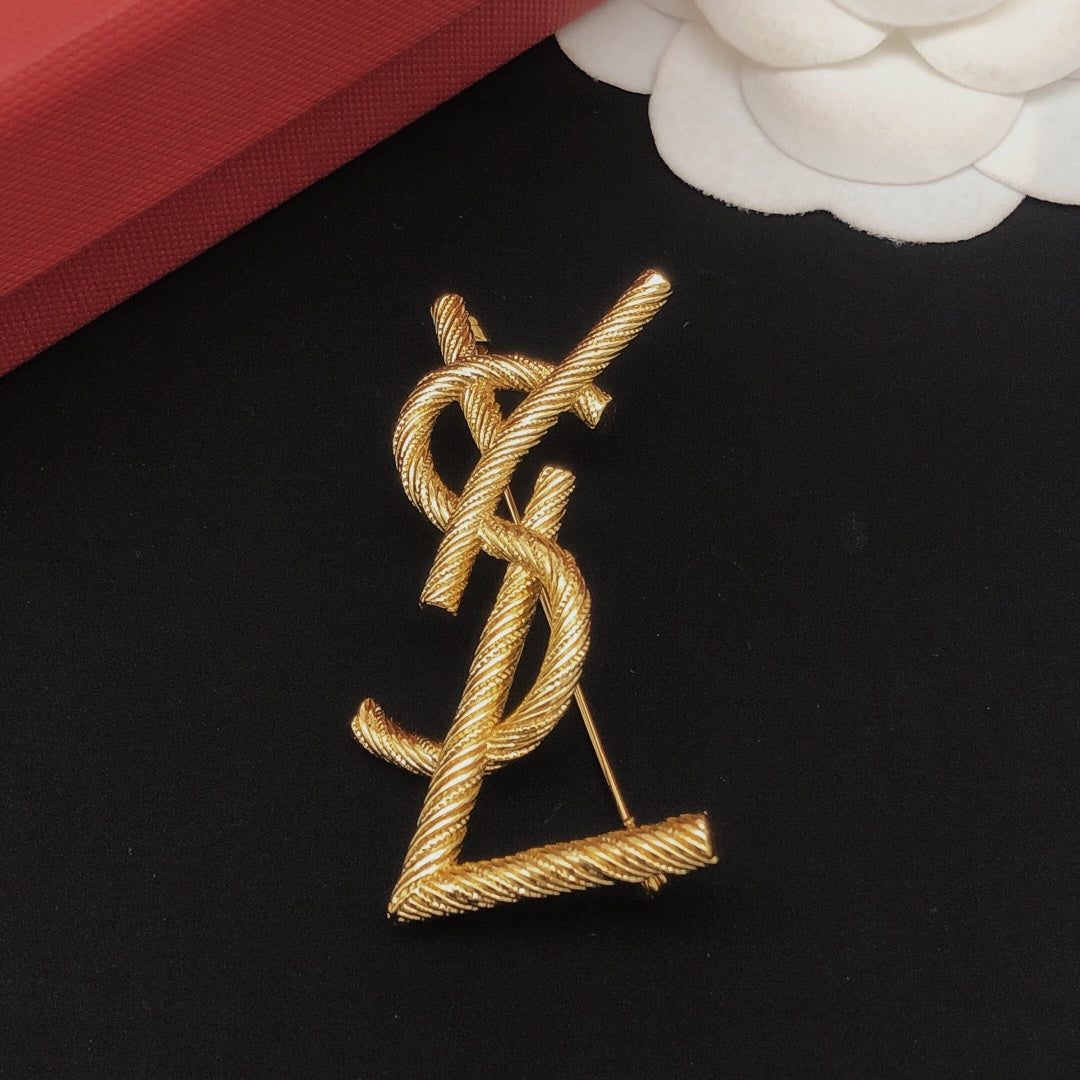 Saint Laurent Gold-Tone Textured Monogram Brooch - album image 8