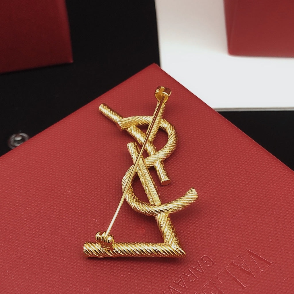 Saint Laurent Gold-Tone Textured Monogram Brooch - album image 7