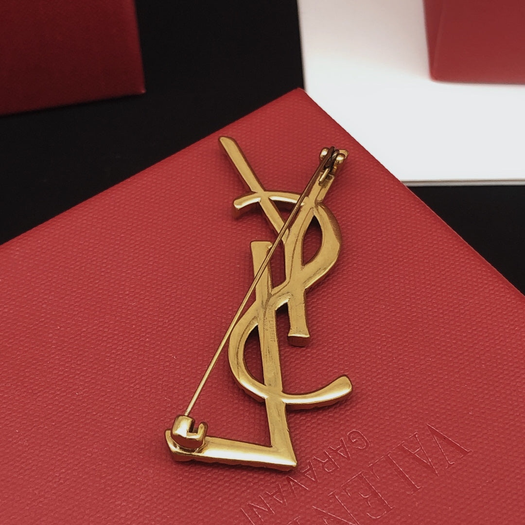 Saint Laurent Antique Gold-Tone Rope-Textured Monogram Brooch - album image 5