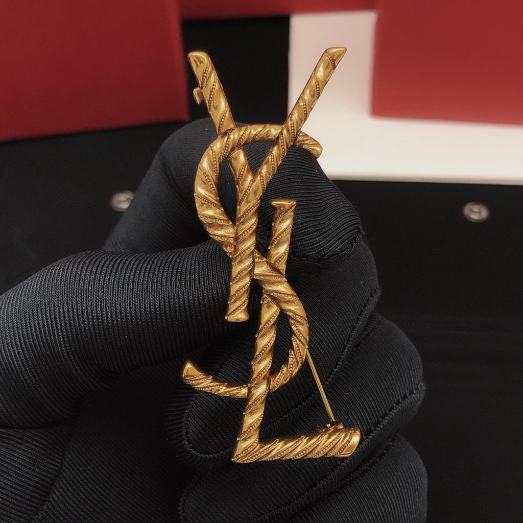 Saint Laurent Antique Gold-Tone Rope-Textured Monogram Brooch - album image 1