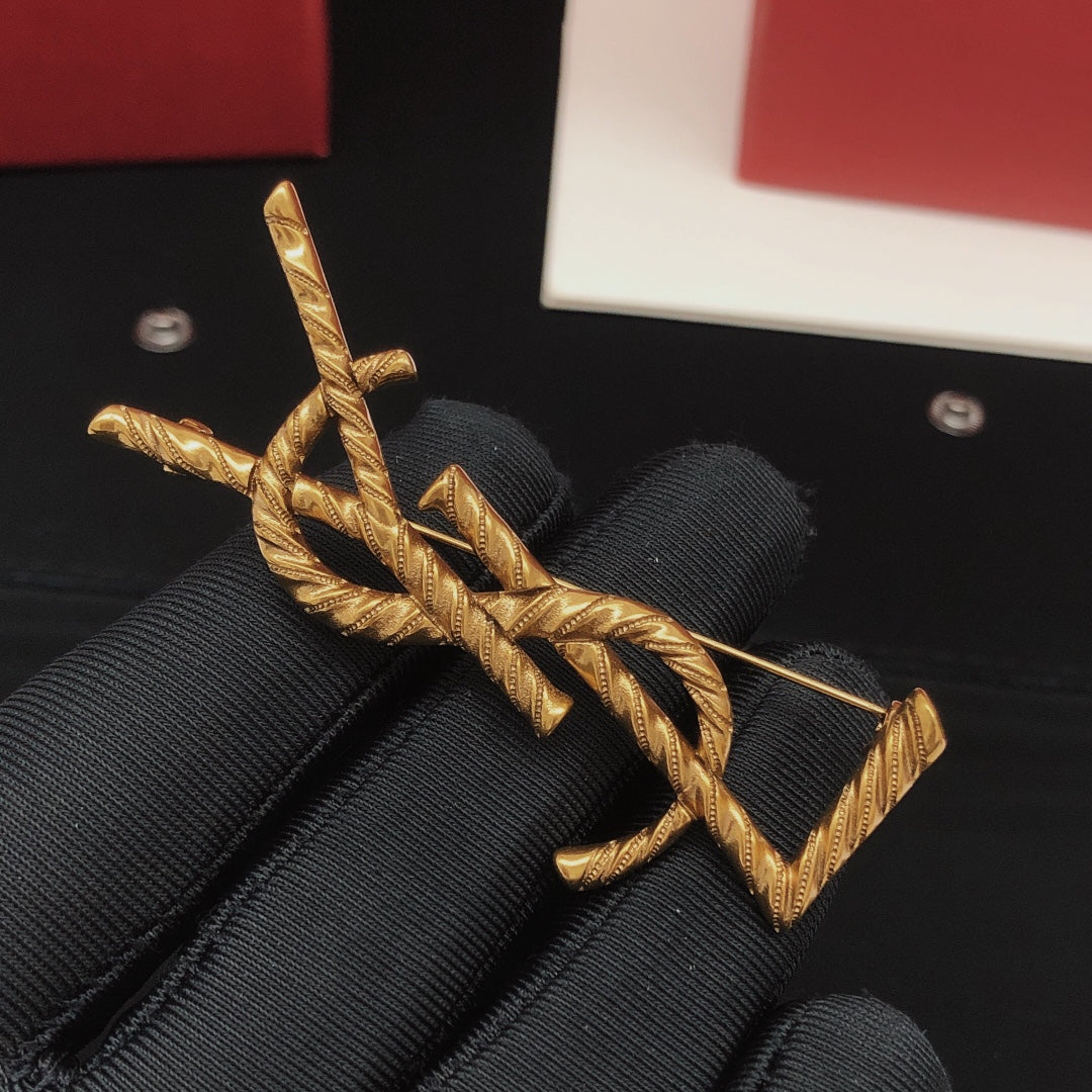 Saint Laurent Antique Gold-Tone Rope-Textured Monogram Brooch - album image 3