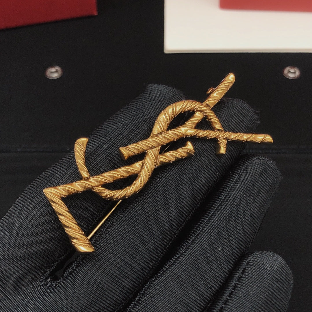 Saint Laurent Antique Gold-Tone Rope-Textured Monogram Brooch - album image 2