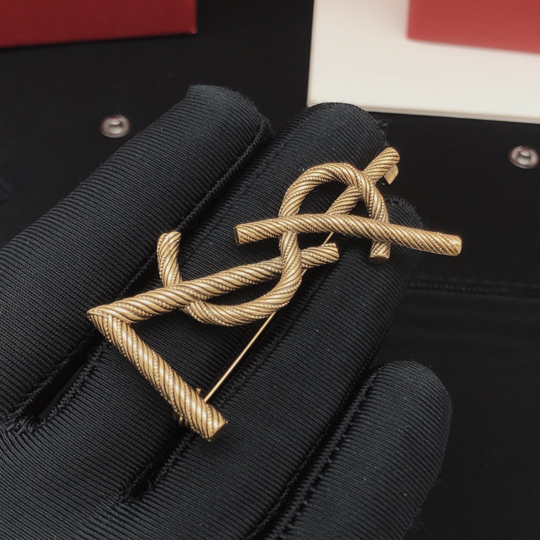 Saint Laurent Antique Gold-Tone Twisted Monogram Brooch - album image 3