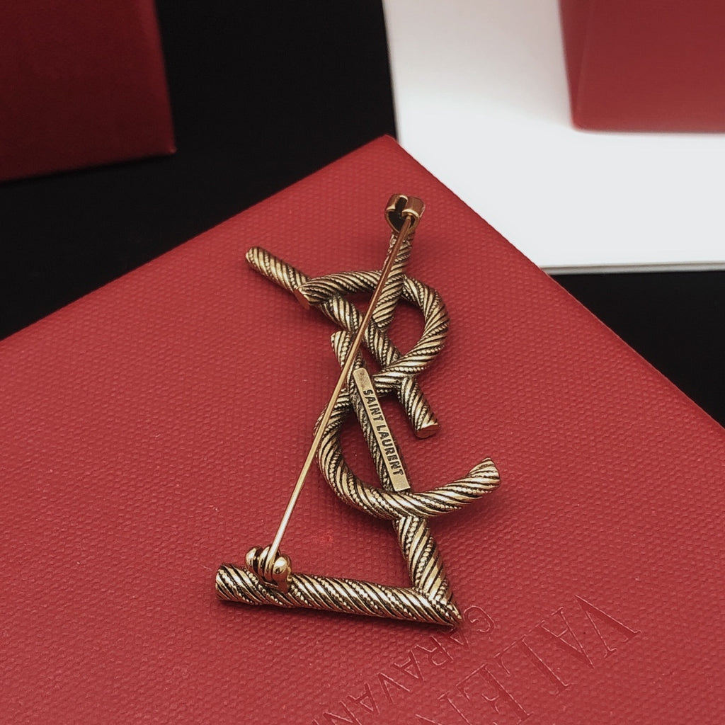 Saint Laurent Antique Gold-Tone Twisted Monogram Brooch - album image 5