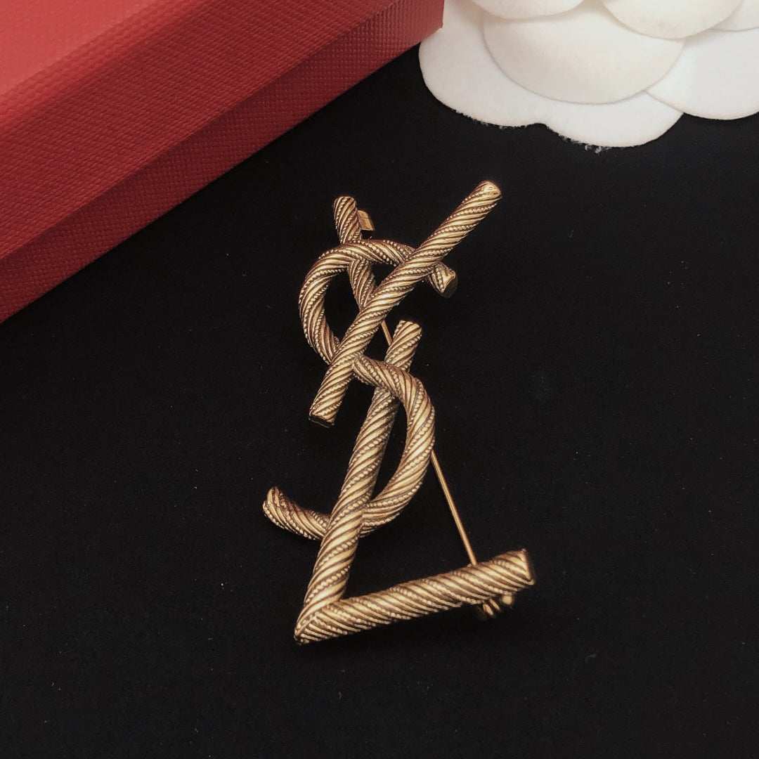 Saint Laurent Antique Gold-Tone Twisted Monogram Brooch - album image 7