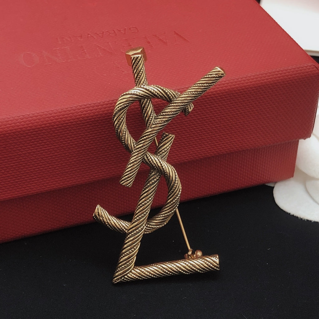 Saint Laurent Antique Gold-Tone Twisted Monogram Brooch - album image 8
