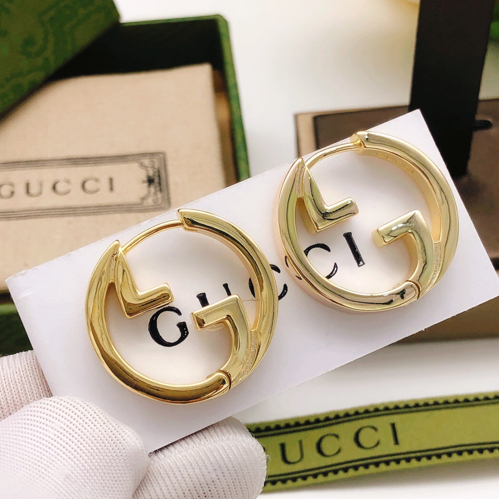 Gucci Circular Polished Earrings - album image 1