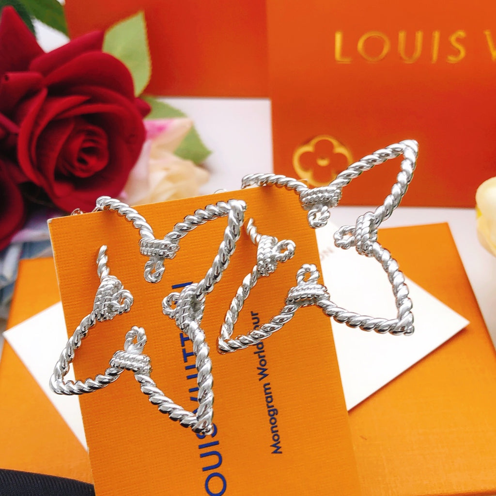 Louis Vuitton Silver-Tone Twisted Earrings - album image 8