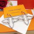 Louis Vuitton Silver-Tone Twisted Earrings - album image 1