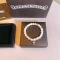 Chrome Hearts White Bead Cross Drop Bracelet - album image 1