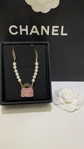 Chanel Interlocking C Checkered Pink Pearl Diamond-Shape Necklace - album image 1