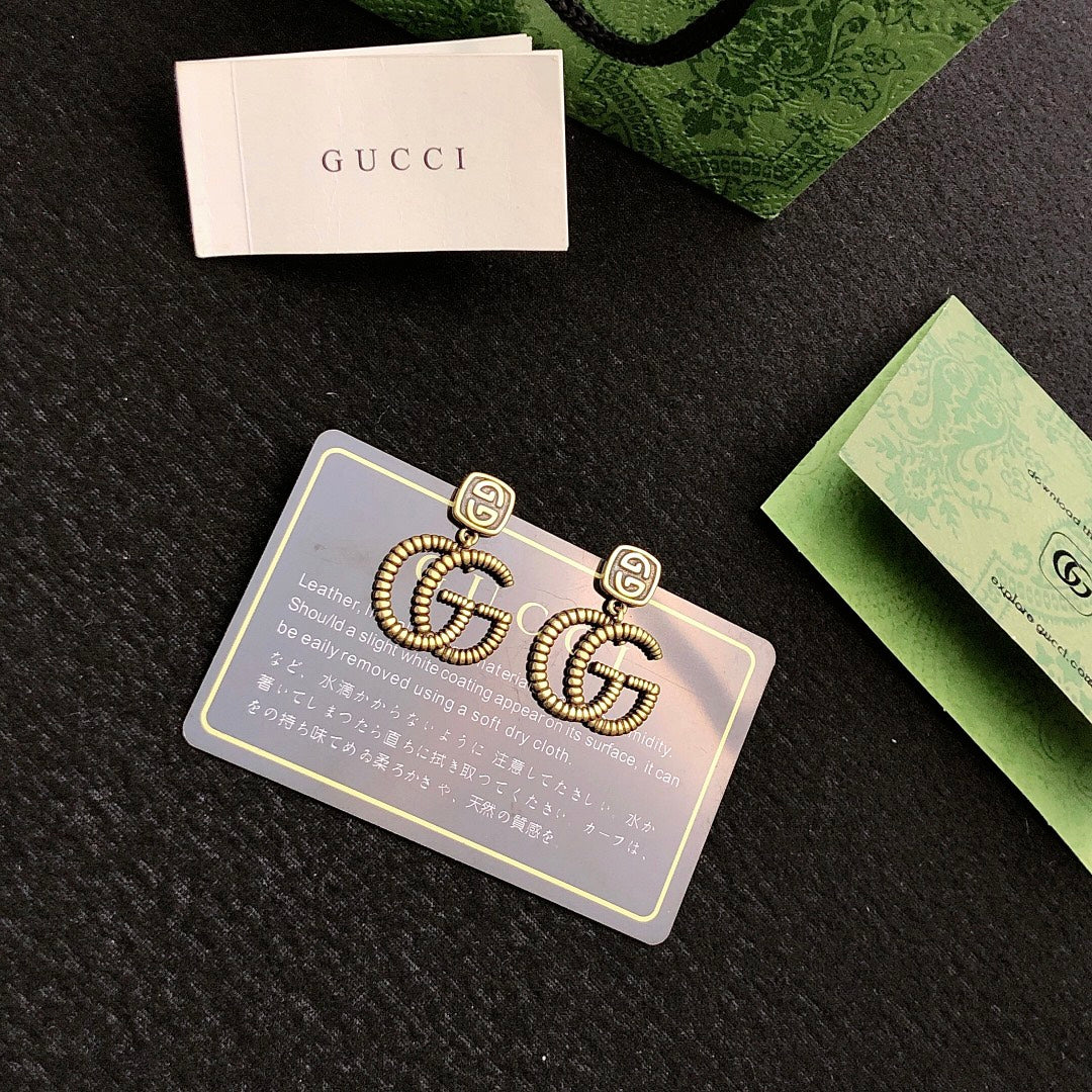 Gucci Gold-Tone Interlocking G Stud Earrings - album image 3