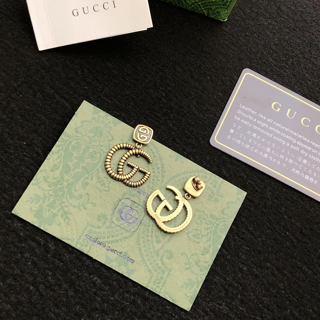 Gucci Gold-Tone Interlocking G Stud Earrings - album image 1