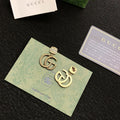 Gucci Gold-Tone Interlocking G Stud Earrings - album image 1