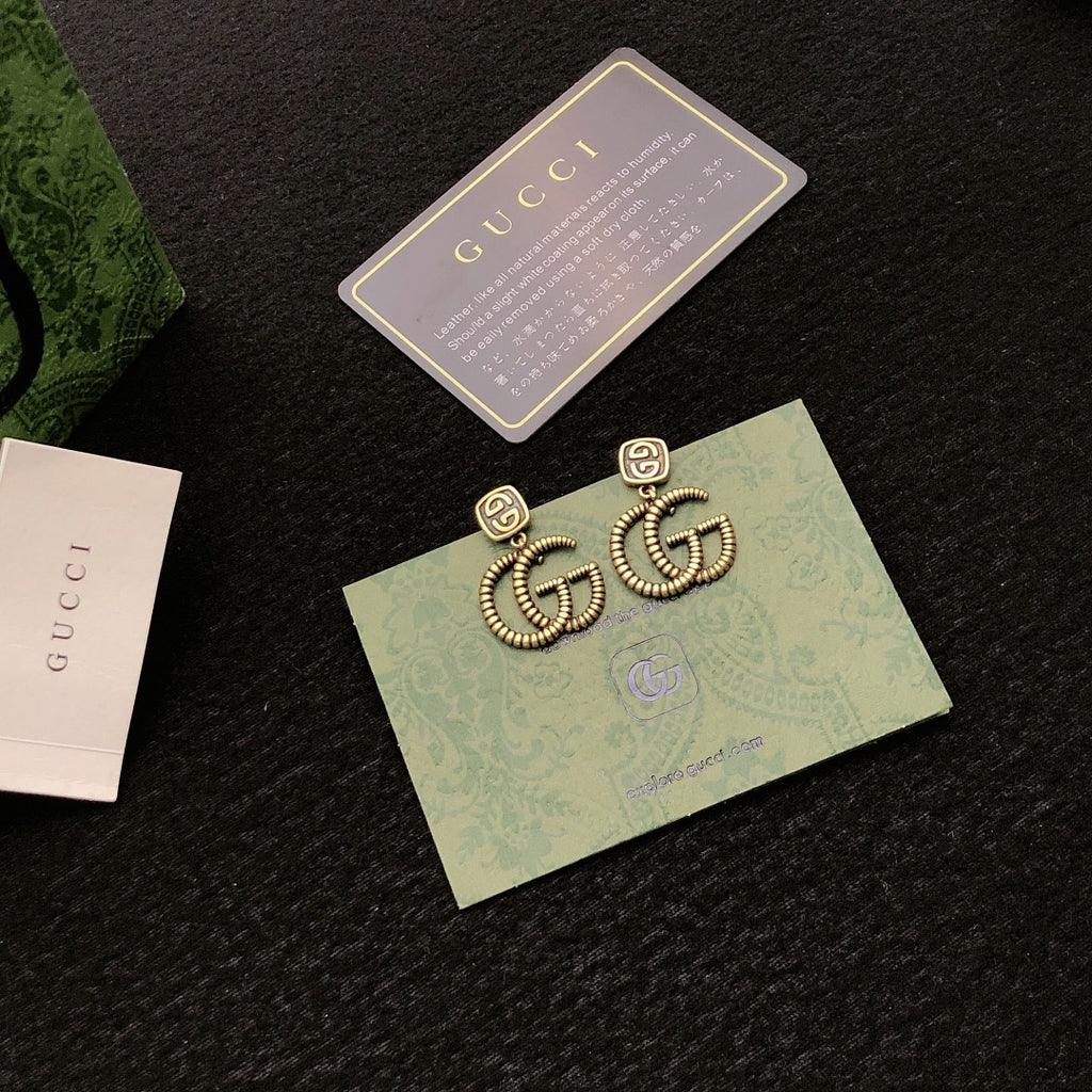 Gucci Gold-Tone Interlocking G Stud Earrings - album image 2
